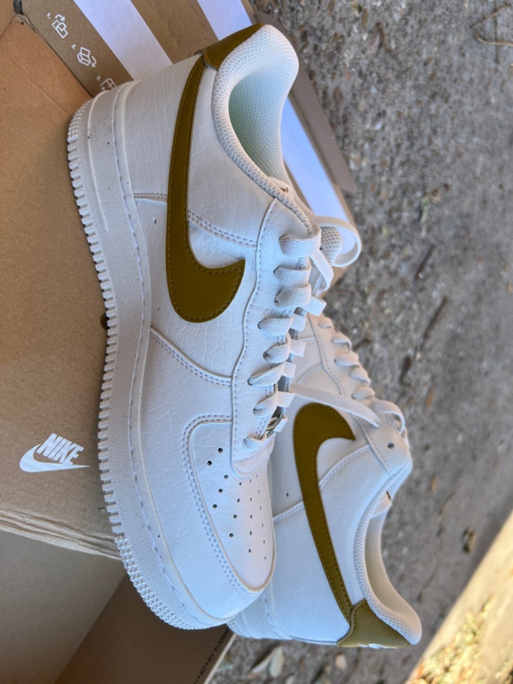 Nike White Leather Sneakers with Bronze Swoosh
